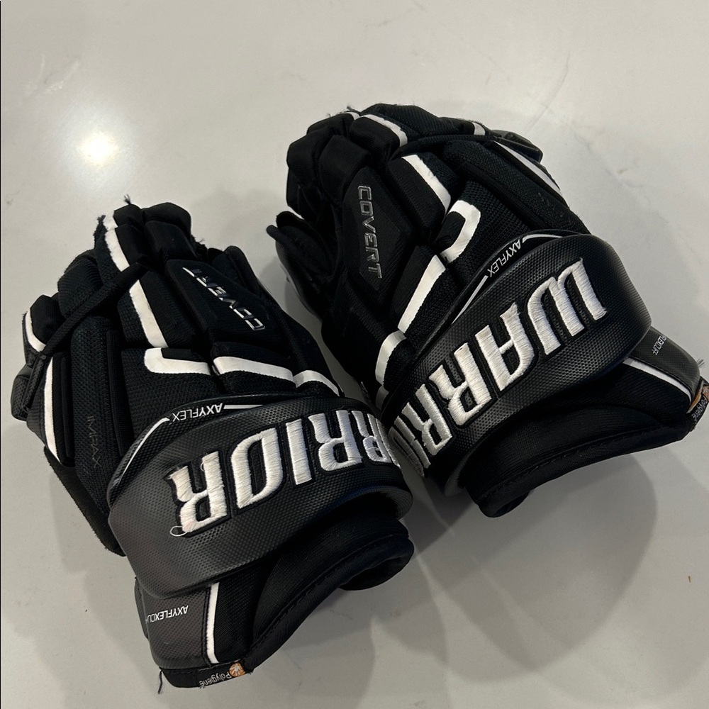 Warrior Covert QR5 Pro Black and White Hockey Gloves. 12” Junior
